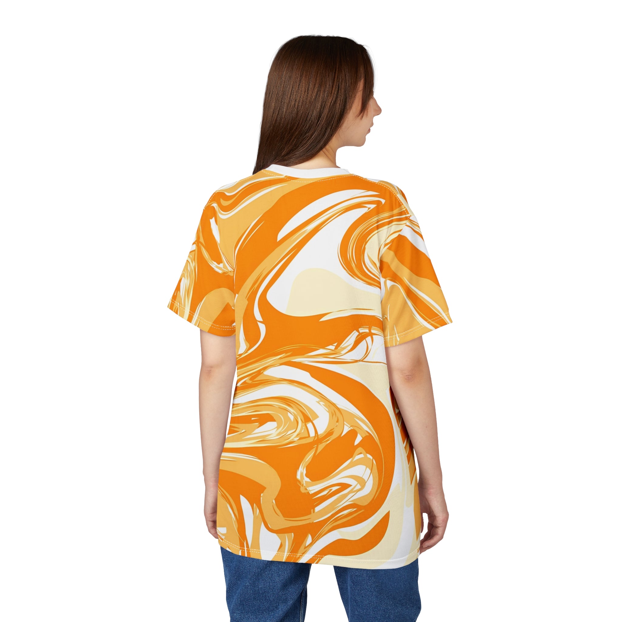 Woman wearing a colorful tunic with swirling patterns on a white background